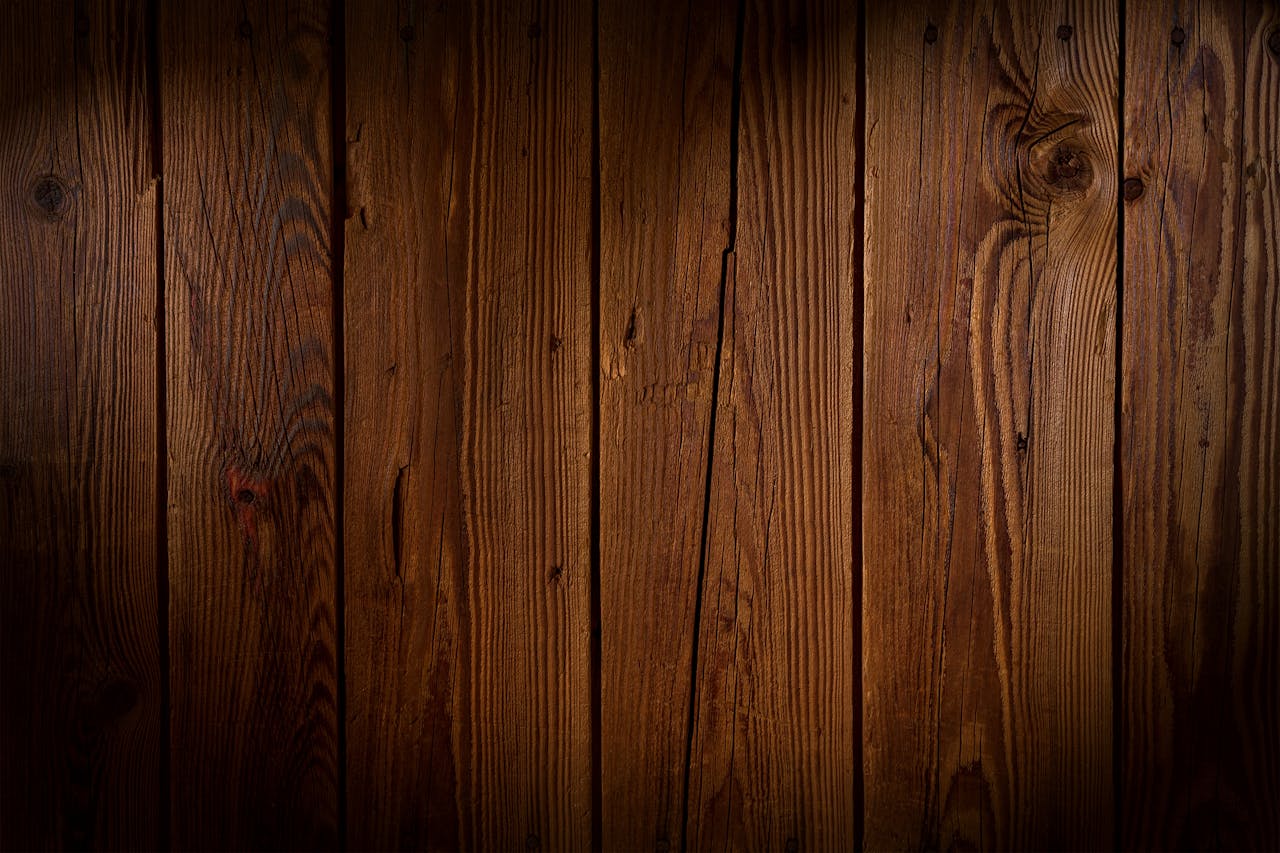 High-quality rustic wooden plank background showcasing natural wood grain texture, ideal for design and decor projects.